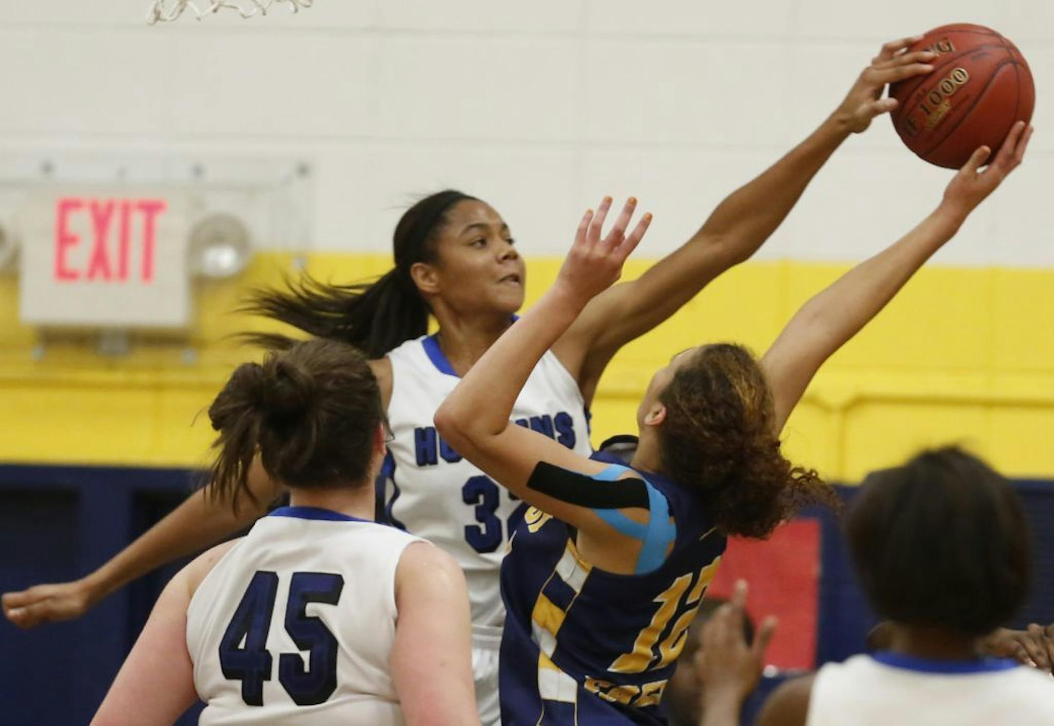 Nia Coffey of Hopkins blocked a shot by Isieoma Odor in the closing minutes.