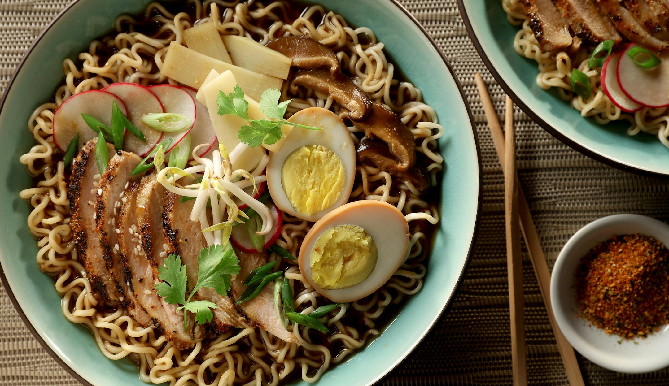 Grilled shichimi togarashi-flavored chicken and soy-wasabi hard-cooked eggs bolster homemade ramen. (Michael Tercha/Chicago Tribune/TNS) ORG XMIT: 1185932