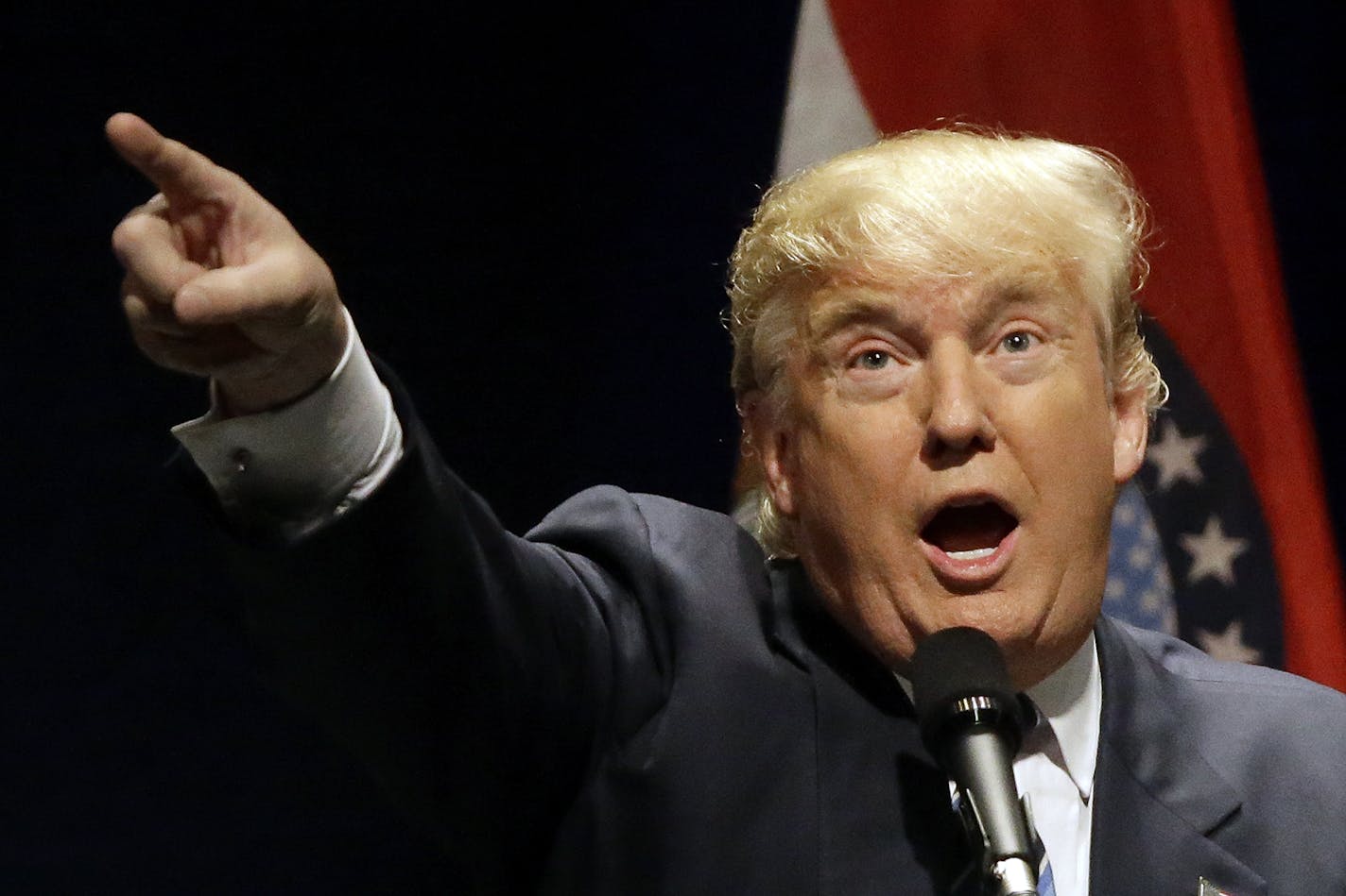 Republican presidential candidate Donald Trump speaks during a campaign rally Friday, March 11, 2016, in St. Louis. (AP Photo/Seth Perlman)