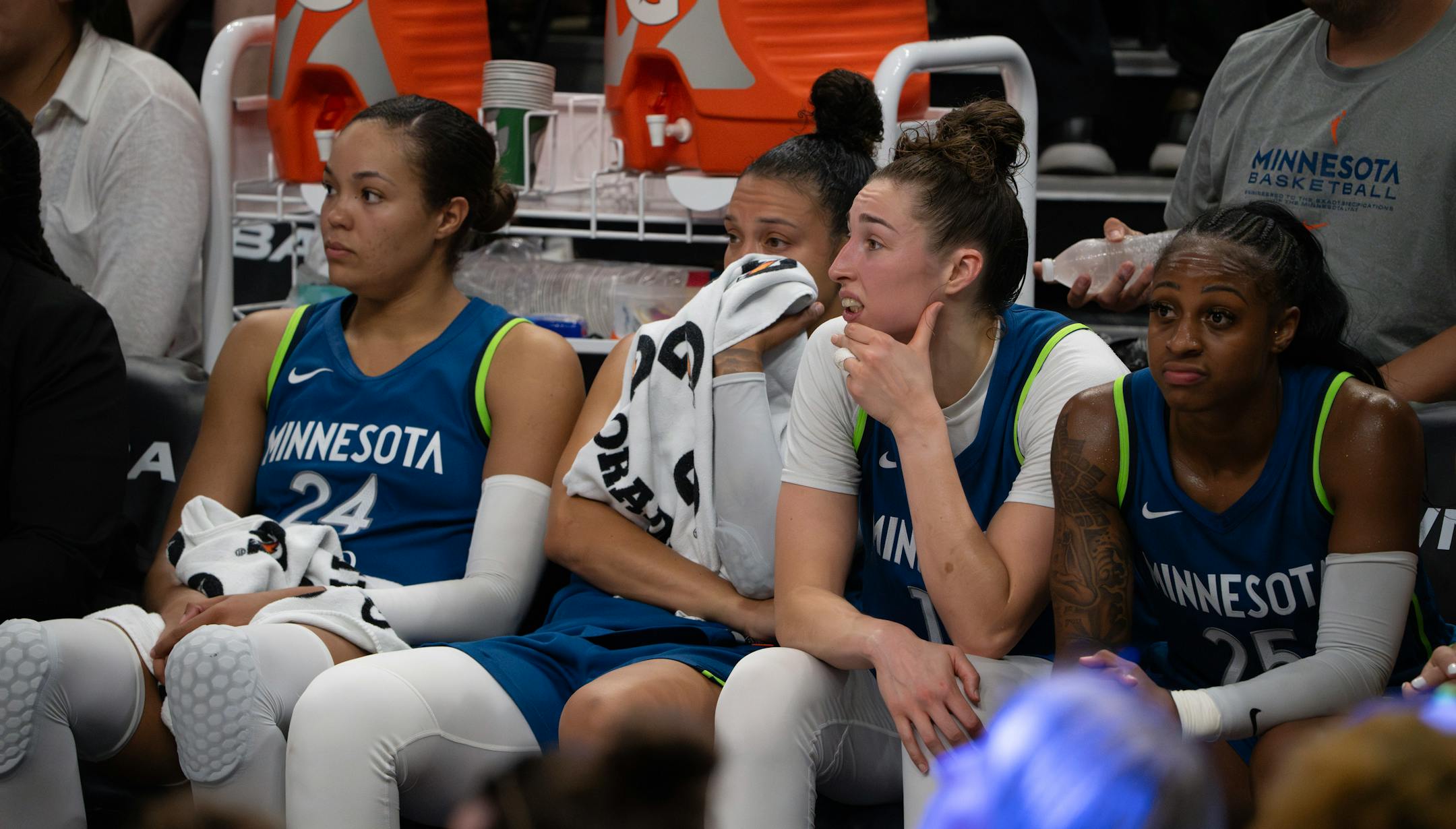 Minnesota Lynx forward Napheesa Collier, guard Kayla McBride, forward Jessica Shepard, and guard Tiffany Mitchell, from left, sat on the bench late in the fourth quarter. The Minnesota Lynx lost to the Seattle Storm 88-74 in a WNBA basketball game Sunday night at Target Center in Minneapolis.