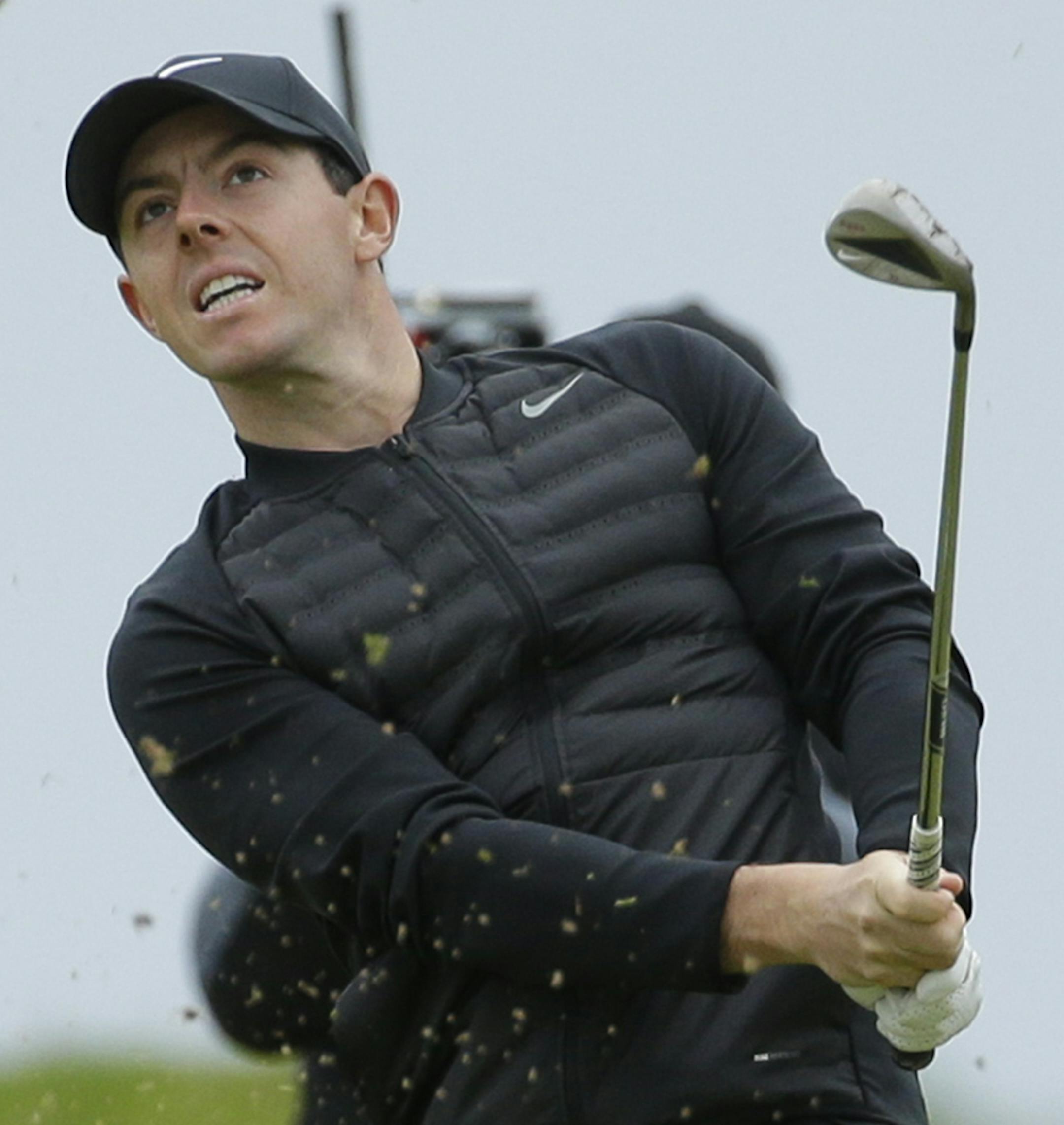 Rory McIlroy of Northern Ireland hits a shot from the 3rd fairway during the third round of the British Open Golf Championship at the Royal Troon Golf Club in Troon, Scotland, Saturday, July 16, 2016. (AP Photo/Matt Dunham)