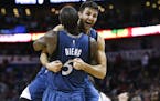 Minnesota Timberwolves guard Ricky Rubio (9) and Minnesota Timberwolves center Gorgui Dieng (5) celebrate after defeating the New Orleans Pelicans 112