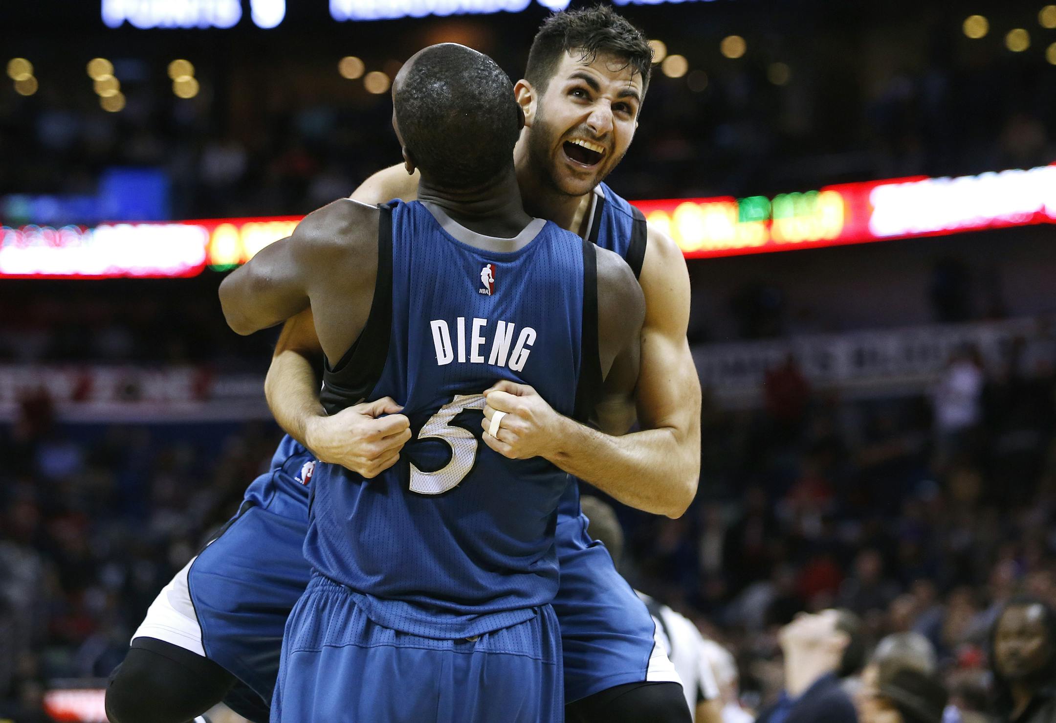 Minnesota Timberwolves guard Ricky Rubio (9) and Minnesota Timberwolves center Gorgui Dieng (5) celebrate after defeating the New Orleans Pelicans 112-110 after an NBA basketball game Saturday, Feb. 27, 2016, in New Orleans. (AP Photo/Jonathan Bachman)