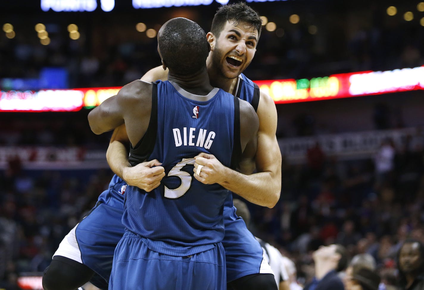 Minnesota Timberwolves guard Ricky Rubio (9) and Minnesota Timberwolves center Gorgui Dieng (5) celebrate after defeating the New Orleans Pelicans 112-110 after an NBA basketball game Saturday, Feb. 27, 2016, in New Orleans. (AP Photo/Jonathan Bachman)