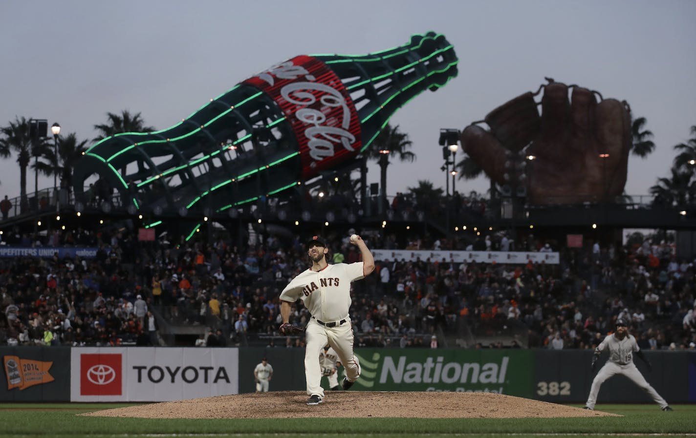 San Francisco Giants pitcher Madison Bumgarner throws to a Colorado Rockies batter during the sixth inning of a baseball game in San Francisco, Tuesday, June 25, 2019. (AP Photo/Jeff Chiu)