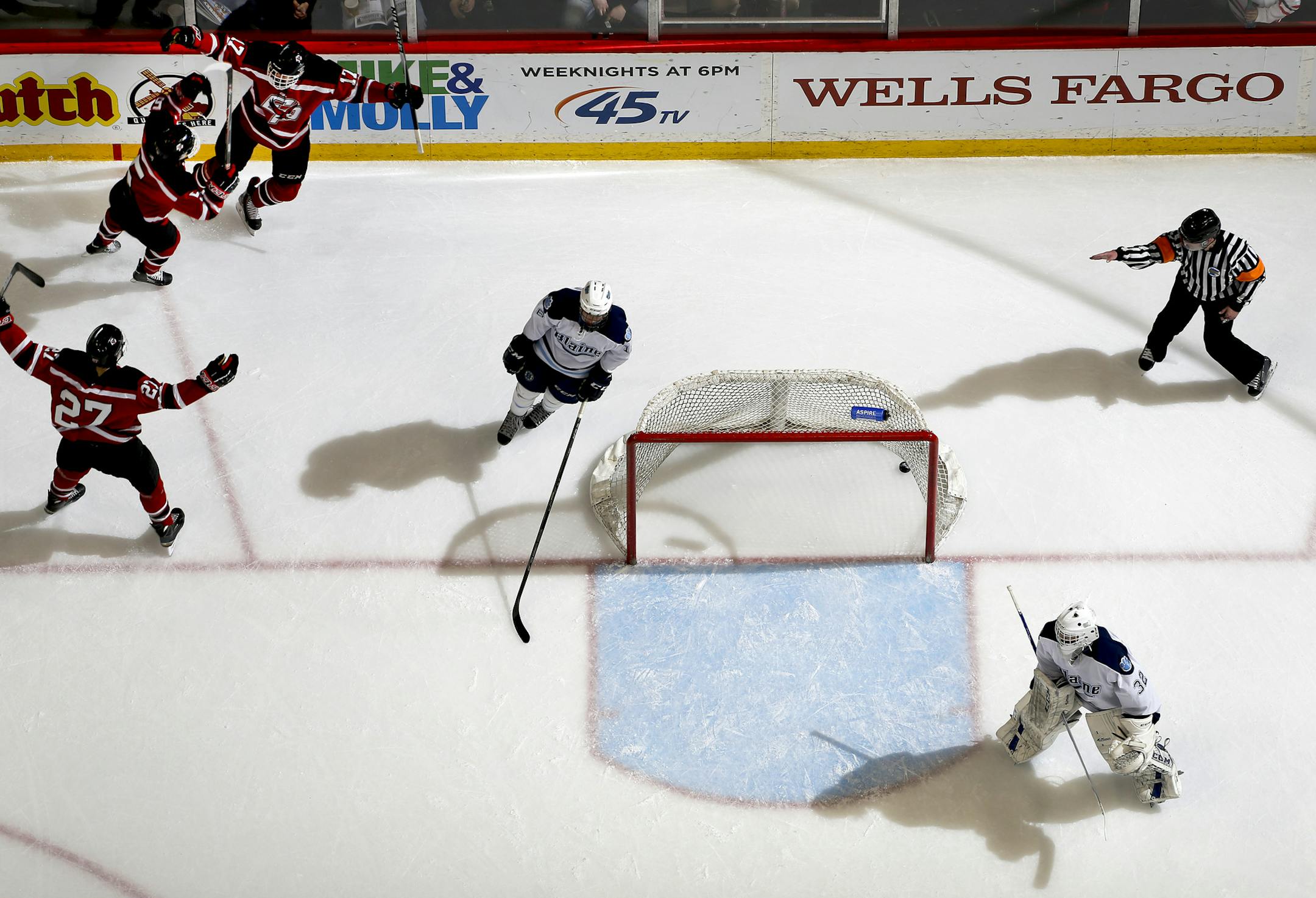 Eden Prairie celebrated a goal by Cole Lawrence (17) in the second period. ] CARLOS GONZALEZ cgonzalez@startribune.com, March 5, 2015, St. Paul, MN, Xcel Energy Center, Minnesota boys hockey state tournament quarterfinals, Class 2A, Eden Prairie vs. Blaine