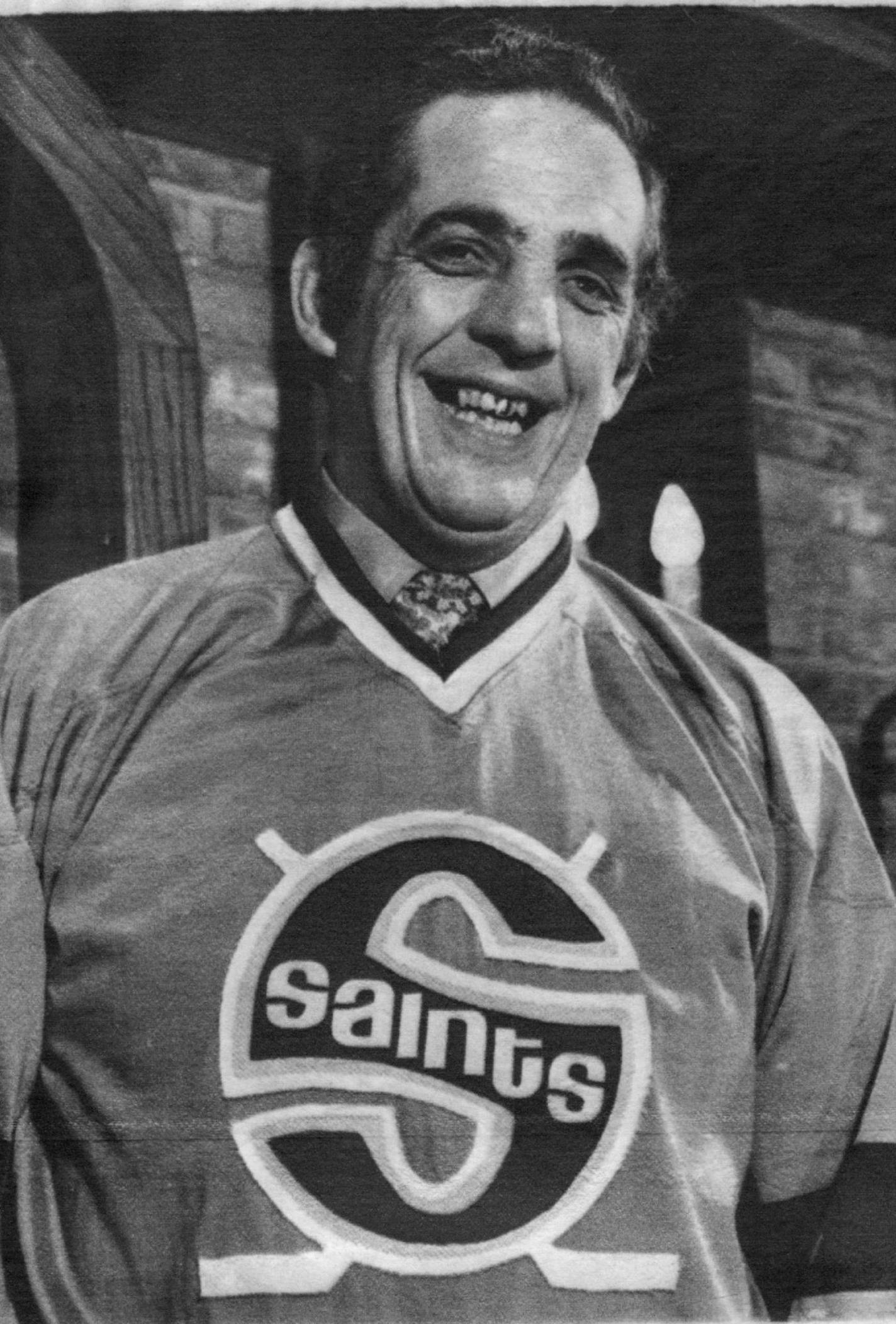 December 13, 1971 Glen Sonmor, new general Manager-coach of the World Hockey Association's St. Paul, Minn., franchise, said "If I'm going to play I want to renegotiate," as he tried on the teams jersey during a news conference 12/13. Sonmor, 42, is expected to resign his post as hockey coach at the University of Minnesota 12/13. December 14, 1971 UPI