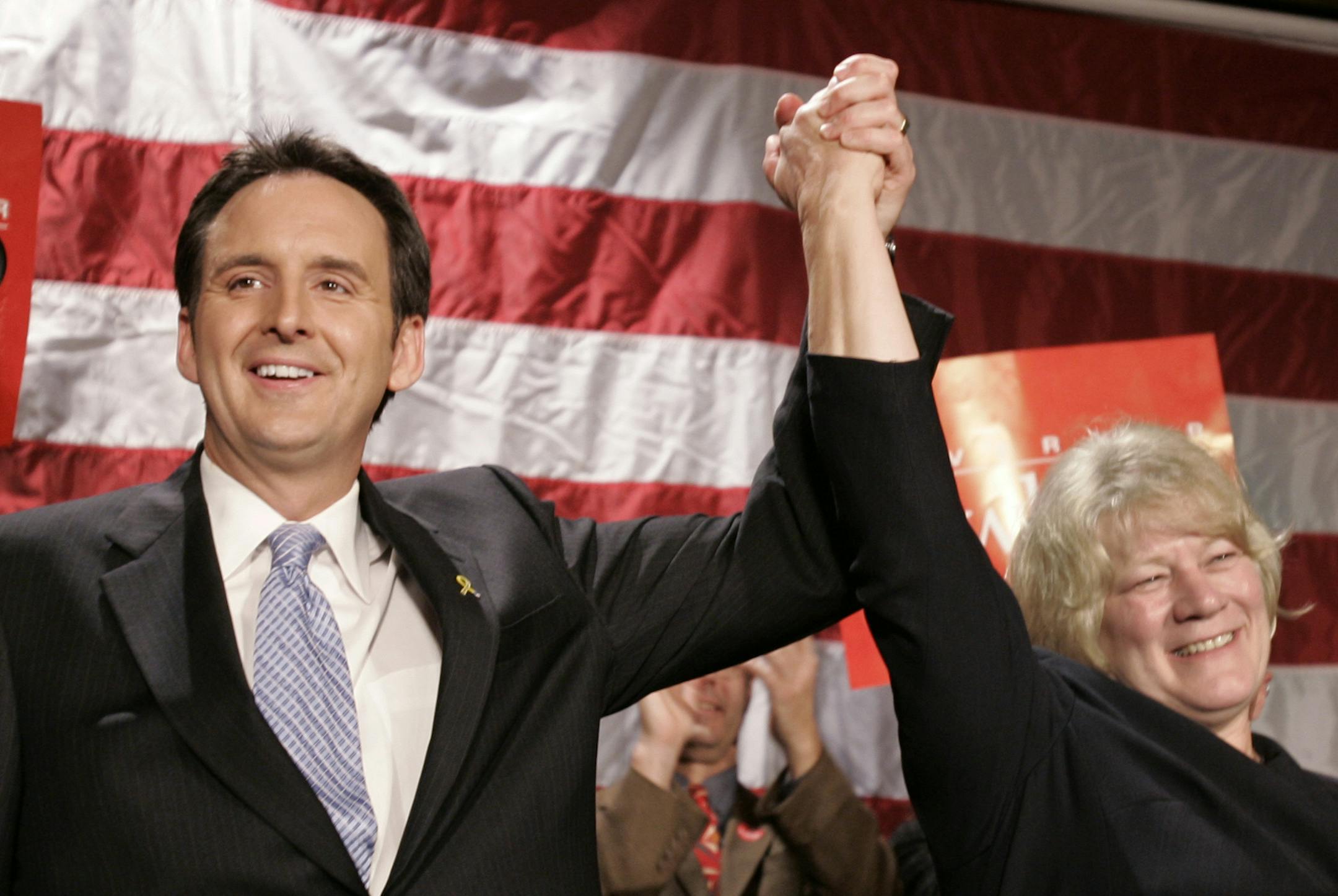 Republican Gov. Tim Pawlenty and Lt. Gov. Carol Molnau celebrate at election night headquarters early Wednesday morning, Nov. 8, 2006 in Bloomington, Minn., after Pawlenty defeated Democrat Mike Hatch in a tight race to win re-election. (AP Photo/Jim Mone) ORG XMIT: MNJM113