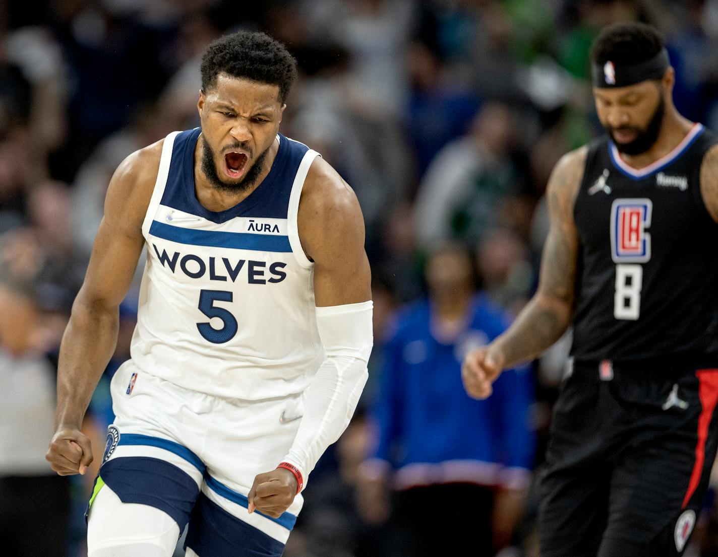 Malik Beasley of the Timberwolves reacts after making a three pointer in the second quarter against the Clippers.