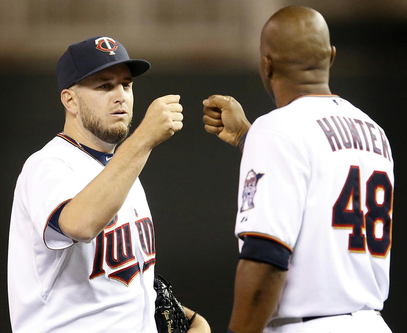 Minnesota Twins closer Glen Perkins (15) celebrated with Torii Hunter at the end of the game. Minnesota beat Boston by a final score of 2-1. ] CARLOS GONZALEZ cgonzalez@startribune.com, May 26, 2015, Minneapolis, MN, Target Field, MLB, Minnesota Twins vs. Boston Red Sox