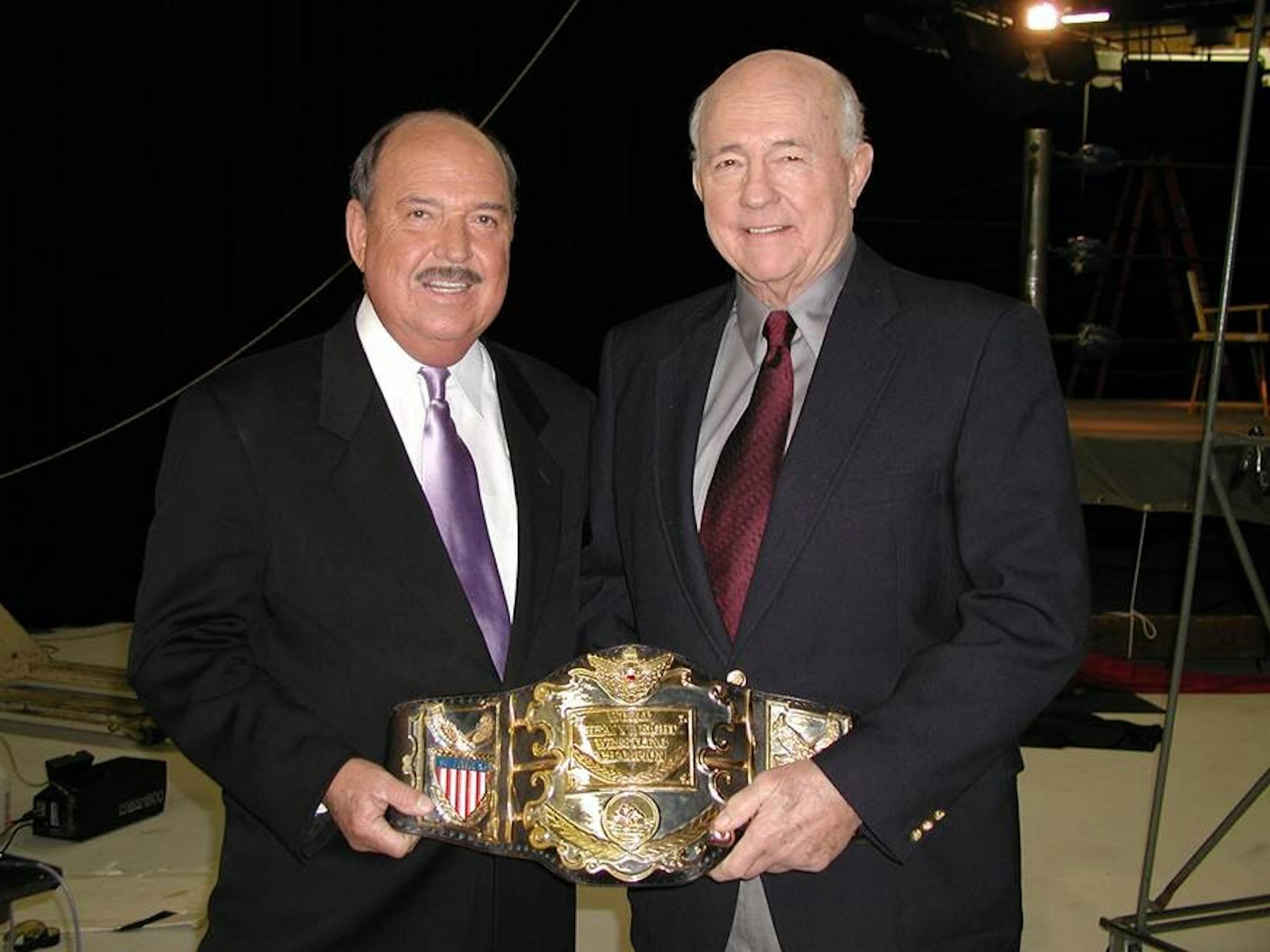 Gene Okerlund, left, with Verne Gagne, wrestler and owner of the Minneapolis-based American Wrestling Association, in 2002.