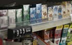 Michelle Kennedy worked on schedules next to a wall of cigarettes at Vernon BP gas station in Edina, Minn., on Tuesday, May 2, 2017. ] RENEE JONES SCH