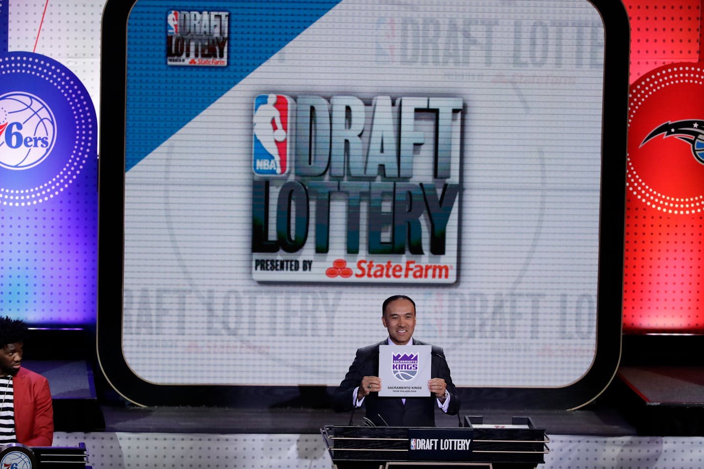 NBA deputy commissioner Mark Tatum announces the results for the Sacramento Kings at the NBA basketball draft lottery, Tuesday, May 16, 2017, in New York. (AP Photo/Frank Franklin II)