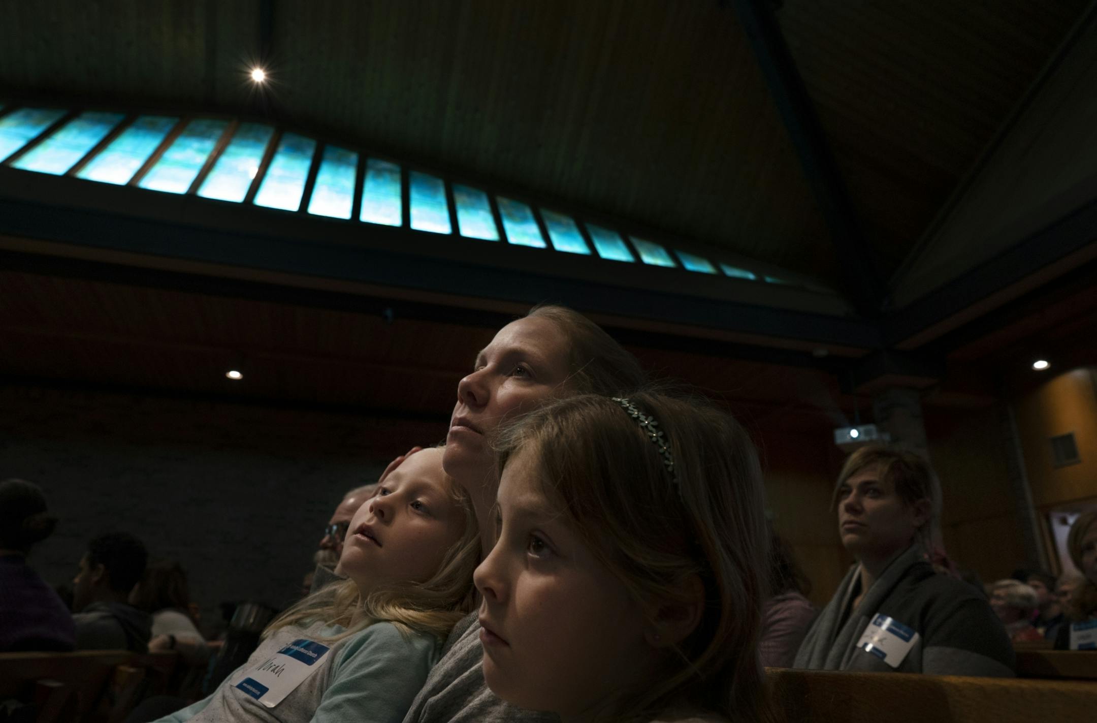 Nativity Lutheran Church is hosted it's 3rd annual MLK Day Celebration & Children's March. The community celebration is a collaboration between Saint Anthony Village Residents, Nativity Lutheran Church, Family Services Collaborative, Saint Anthony Village High School's Dare2BeReal Club. Carrie Sypherd and her daughters Norah Sypherd 6, and her sister Kendall Sypherd 8, listened as activist Joe Davis as he spoke to those who attended the 3rd annual Martin Luther King Day celebration and march Mon