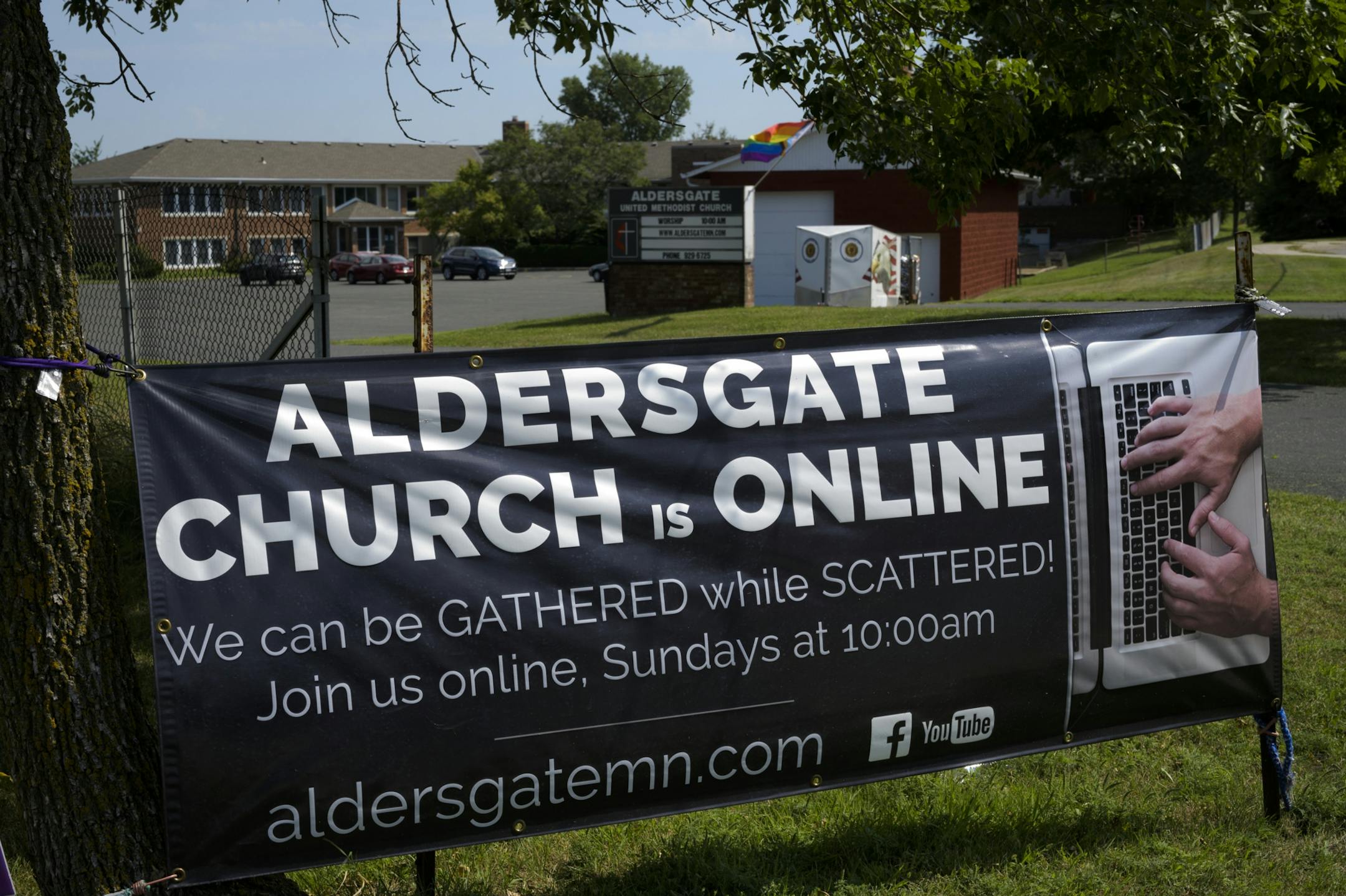 A sign, advertising online worship, outside Aldersgate United Methodist Church Friday.