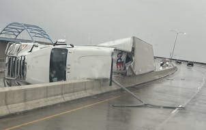 A FedEx truck tipped over on the Richard I. Bong Memorial Bridge on Tuesday evening, a night with heavy winds in northeastern Minnesota.