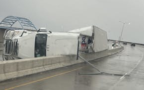 A FedEx truck tipped over on the Richard I. Bong Memorial Bridge on Tuesday evening, a night with heavy winds in northeastern Minnesota.