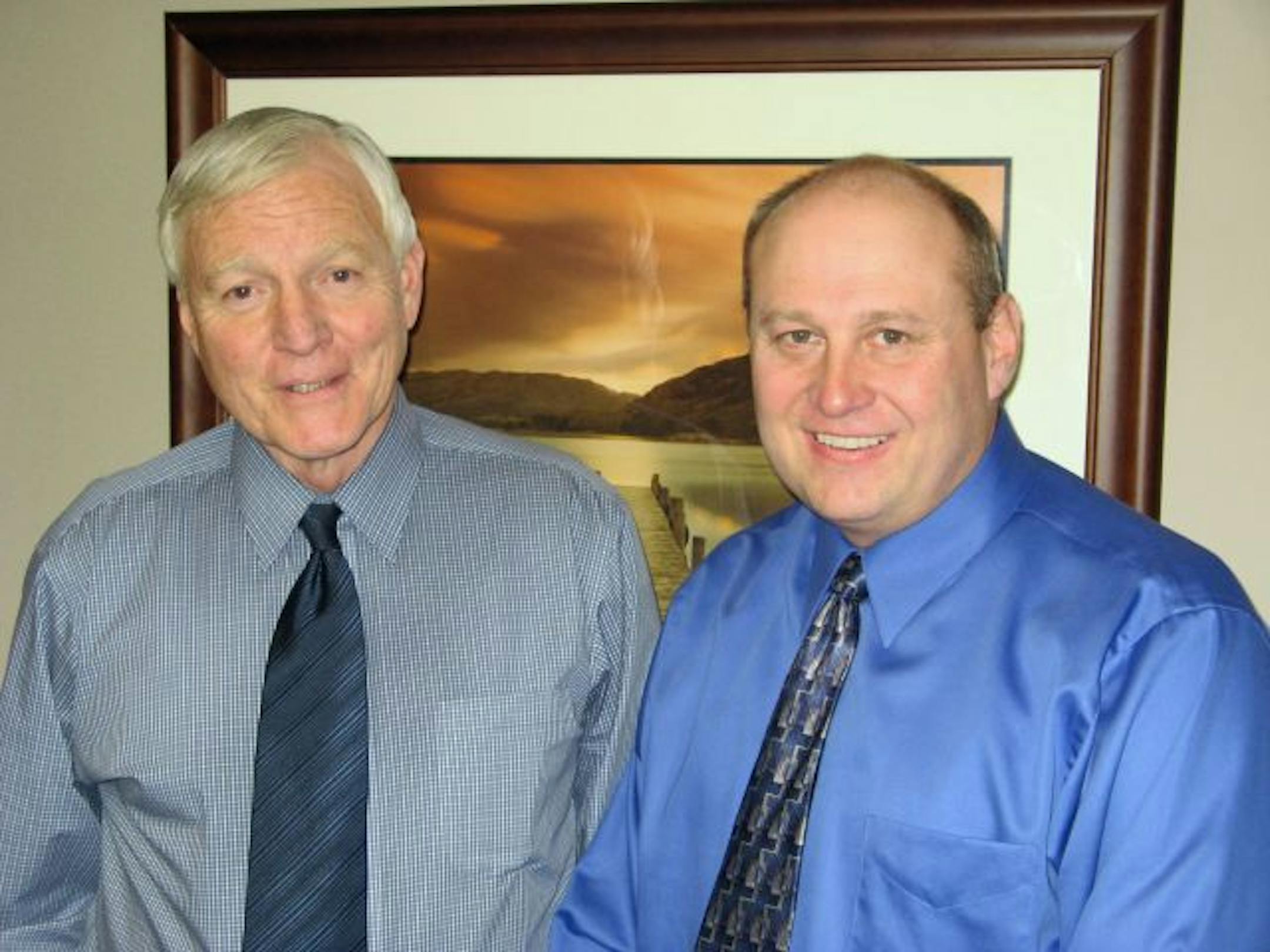 Neal St. Anthony photo Bruce Bomier, left and Jeff Athmann, right, for Nealst0202