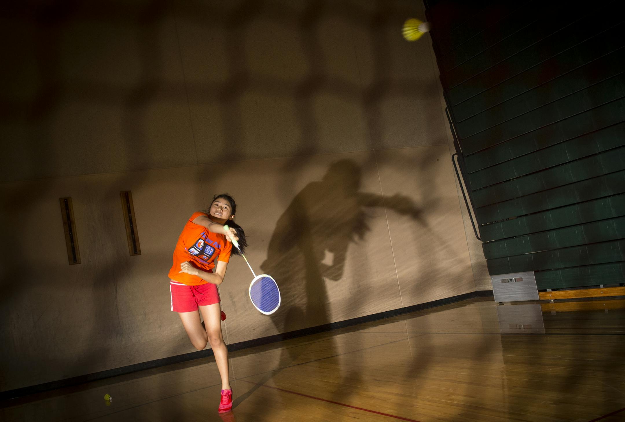 Sonam Palmo, a senior at Edina, practices her jump smash during an Edina badminton team practice on Friday at South View Middle School. ] (Aaron Lavinsky | StarTribune) West zone feature on growing popularity of high school badminton. An Edina practice was photographed Friday, March 28, 2015.