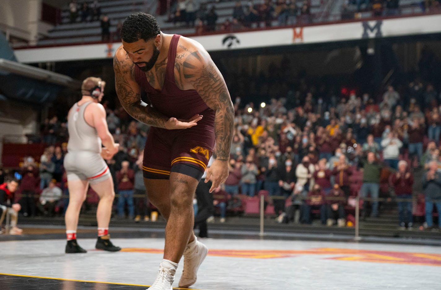 Gable Steveson takes a bow after defeating Tate Orndorff from Ohio State with a technical fall in his final home meet Friday, Feb. 11, 2022 at Maturi Pavilion in Minneapolis, Minn. Steveson is the nation's No. 1-ranked heavyweight and defending NCAA and Olympic champion. He rose to national fame when he won the gold medal in men's freestyle 125kg wrestling for Team USA in the 2020 Summer Olympics in Tokyo. ]