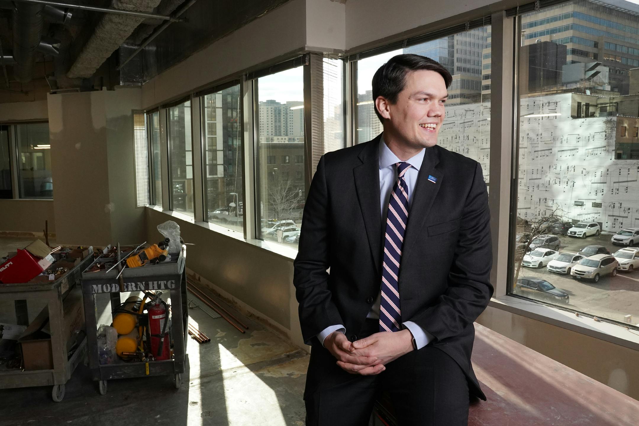 Jeremy Jacobs, managing director of brokerage for Colliers International Twin Cities, at the company's downtown Minneapolis office, which is still under construction, Wednesday. (ANTHONY SOUFFLE/Star Tribune)