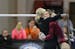 Northfield's Bailey DuPay got a hug from her coach after performing on the uneven bars during the Class 2A gymnastics state meet at the Sport Pavilion