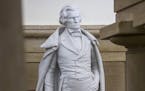 A statue of John C. Calhoun, a pre-Civil War, 19th century South Carolina statesman and slavery supporter, at The Capitol building in Washington, June