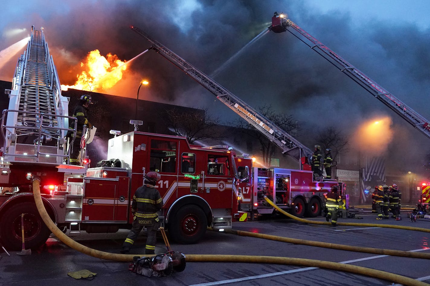 Minneapolis firefighters battled a fire in the 2400 block of Central Avenue Saturday, March 22, 2020 in Northeast Minneapolis. ] ANTHONY SOUFFLE &#x2022; anthony.souffle@startribune.com Minneapolis firefighters battled a fire in the 2400 block of Central Avenue Saturday, March 22, 2020 in Northeast Minneapolis.