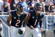 Receiver D.J. Moore, left, and quarterback Justin Fields form a potent 1-2 punch for the Bears.
