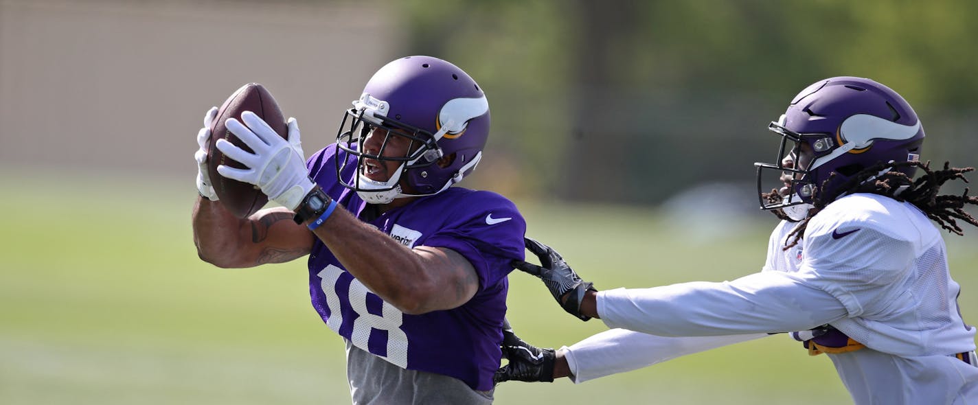 Minnesota Vikings wide receiver Michael Floyd (18) caught a pass over free safety Anthony Harris (41) during practice at Minnesota State University Mankato Sunday July 30, 2017 in Mankato , MN. ] JERRY HOLT &#xef; jerry.holt@startribune.com