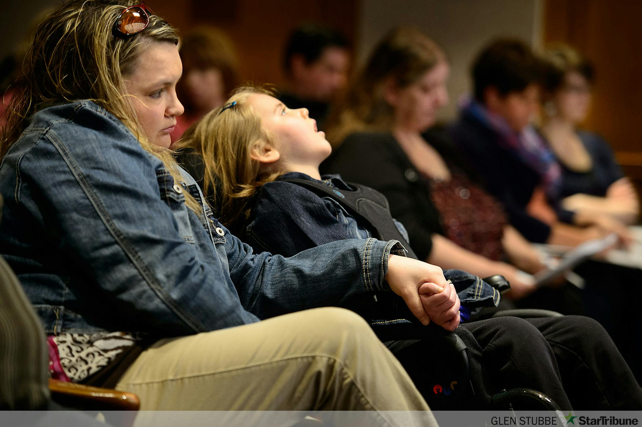 Kristy Pauling held her daughter Katelyn's hand during the hearing.  Katelyn, 7,  has epilepsy and Batten's Disease.  Pauling said others with this condition have benefited from medical marijuana.    ]    The Senate Health and Human Services Committee voted 7-3 to allow patients with certain medical conditions to obtain a doctor's prescription and obtain small amounts of marijuana.   Friday April 25, 2014   GLEN STUBBE * gstubbe@startribune.com