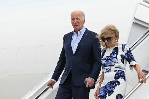 President Joe Biden and First Lady Jill Biden step off Air Force One upon arrival at Francis S. Gabreski Airport in Westhampton Beach, New York, on Sa