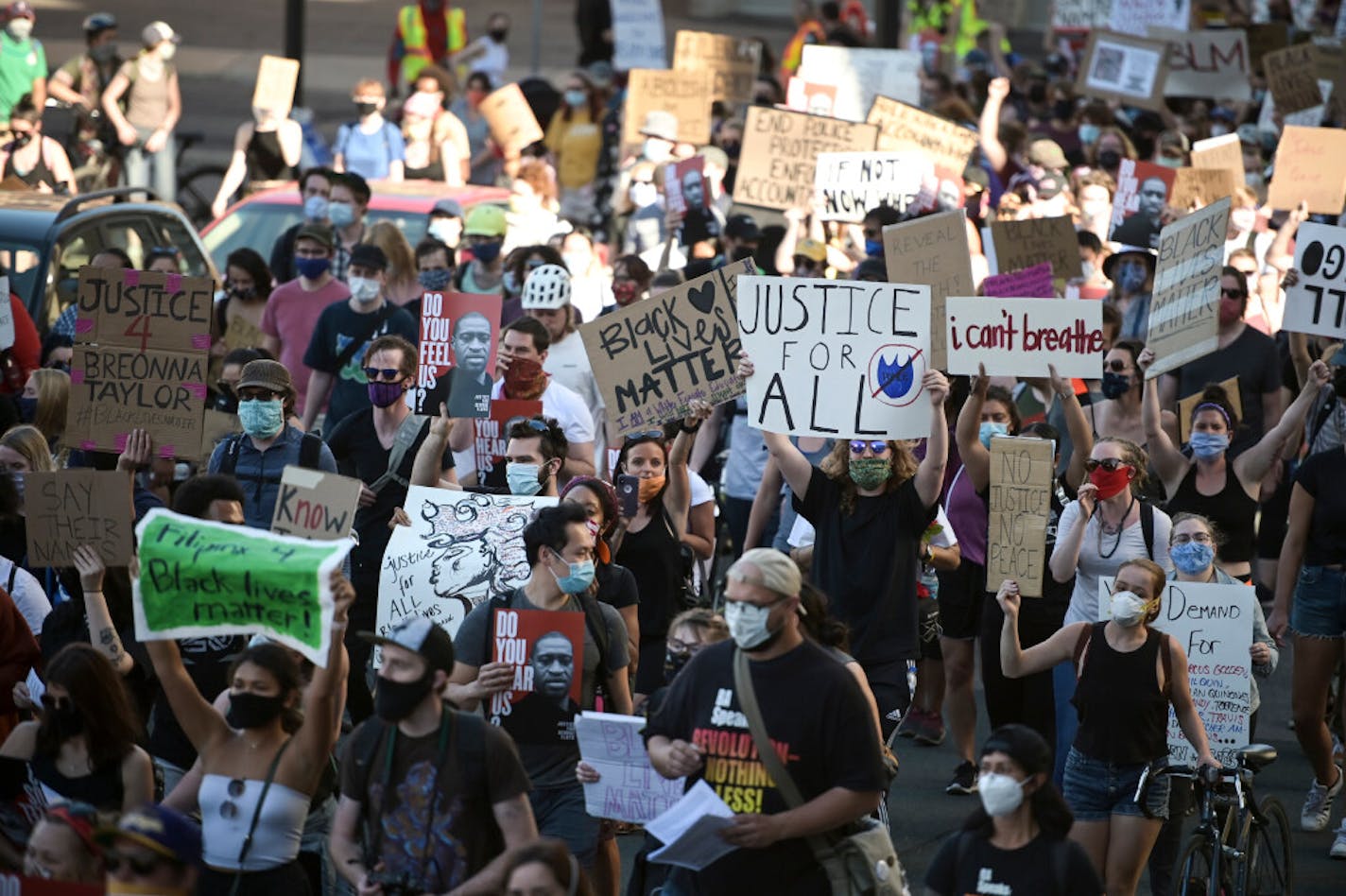 More than 1,000 protesters marched Friday from Minnesota Attorney General Keith Ellison's St. Paul office to the State Capitol.