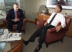 Dave St. Peter and Twins owner Jim Pohlad in Pohlad's office in 2011.