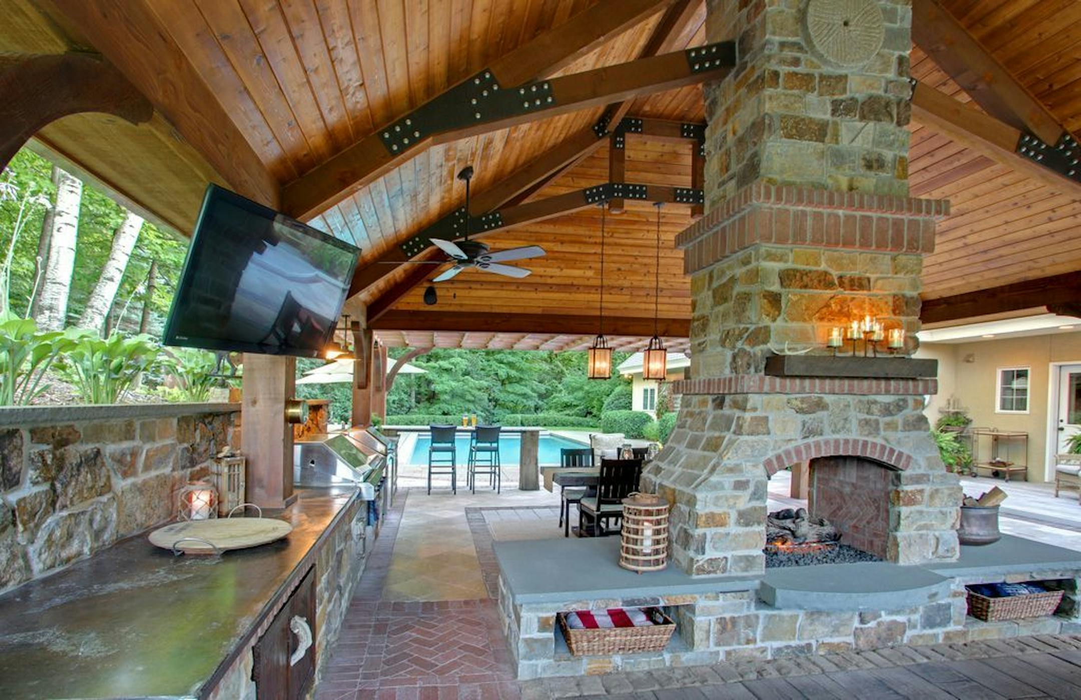 The pavilion includes an outdoor TV on a swivel arm for fall football-watching.