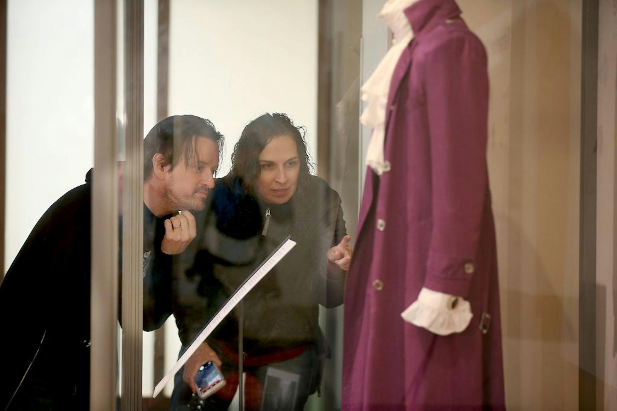 Scott Ewing and his wife Gina Easley, cq, viewed Prince's Purple Rain outfit that is on display at the Minnesota History Center, Friday, April 22, 2016 in St. Paul, MN. The couple went there after leaving First Avenue.