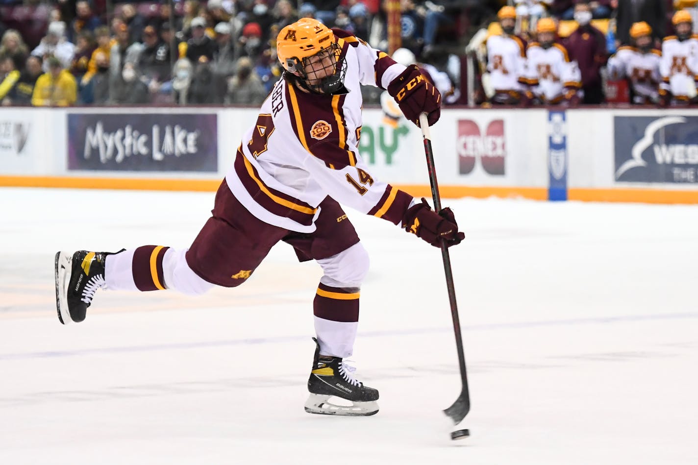 Minnesota defenseman Brock Faber (14) attempts a shot agains Wisconsin during the first period Friday, Feb. 25, 2022 at 3M Arena at Mariucci in Minneapolis, Minn. ] AARON LAVINSKY • aaron.lavinsky@startribune.com