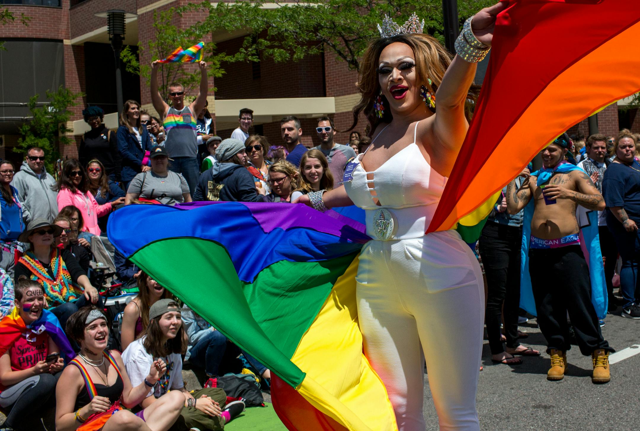 Onya Deek twirls with a cape during the annual Twin Cities Gay Pride Parade down Hennepin Avenue. ] COURTNEY PEDROZA • courtney.pedroza@startribune.com June 25, 2017; Minneapolis; Twin Cities Gay Pride Parade, down Hennepin