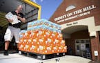 Red Cross volunteer Dennis Cadman packs a pallet of snacks for delivery to Trinity On The Hill United Methodist Church, Tuesday, Sept. 3, 2019 in Augu