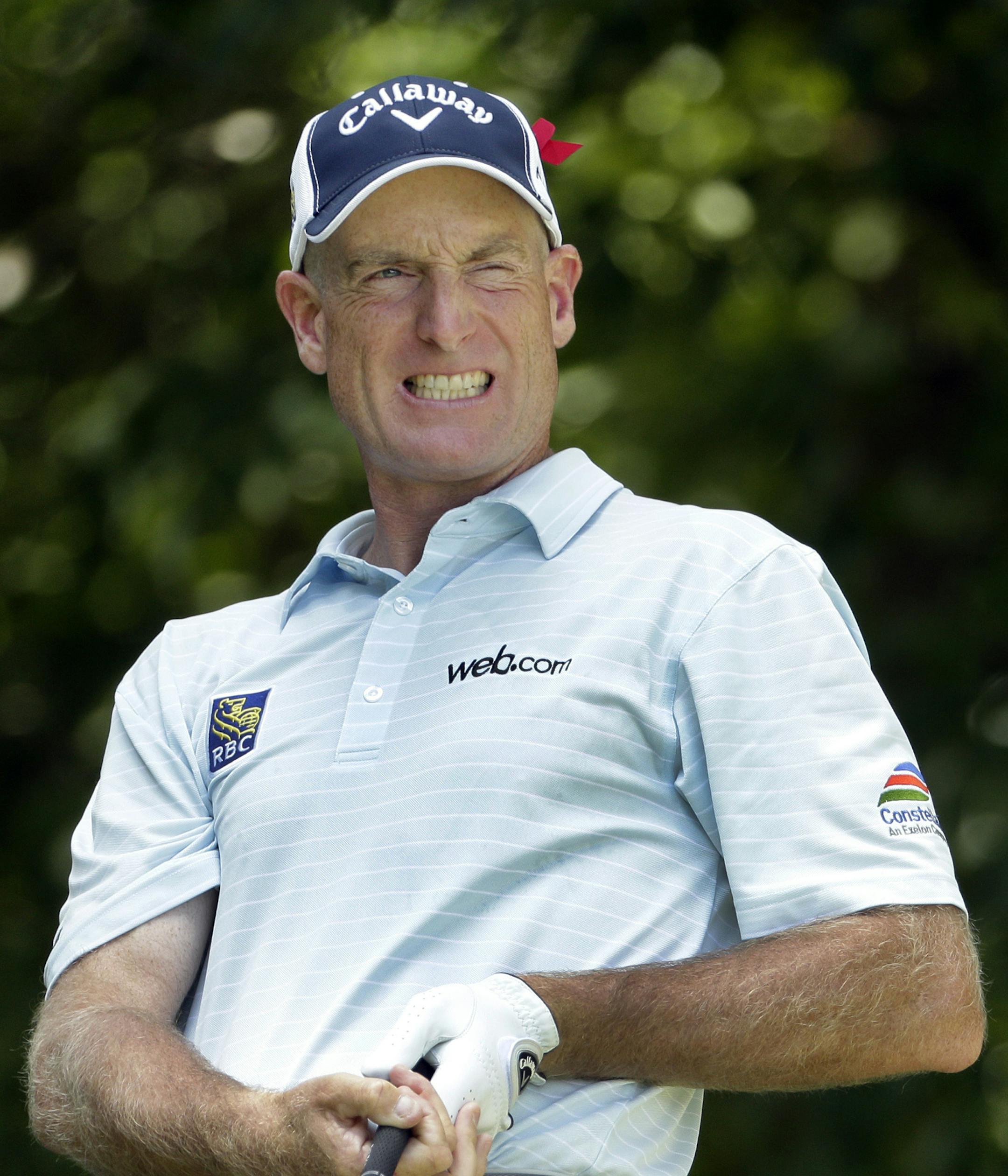 Jim Furyk reacts to his tee shot on the second hole during the third round of the Wyndham Championship golf tournament in Greensboro, N.C., Saturday, Aug. 20, 2016. (AP Photo/Chuck Burton) ORG XMIT: NCCB105