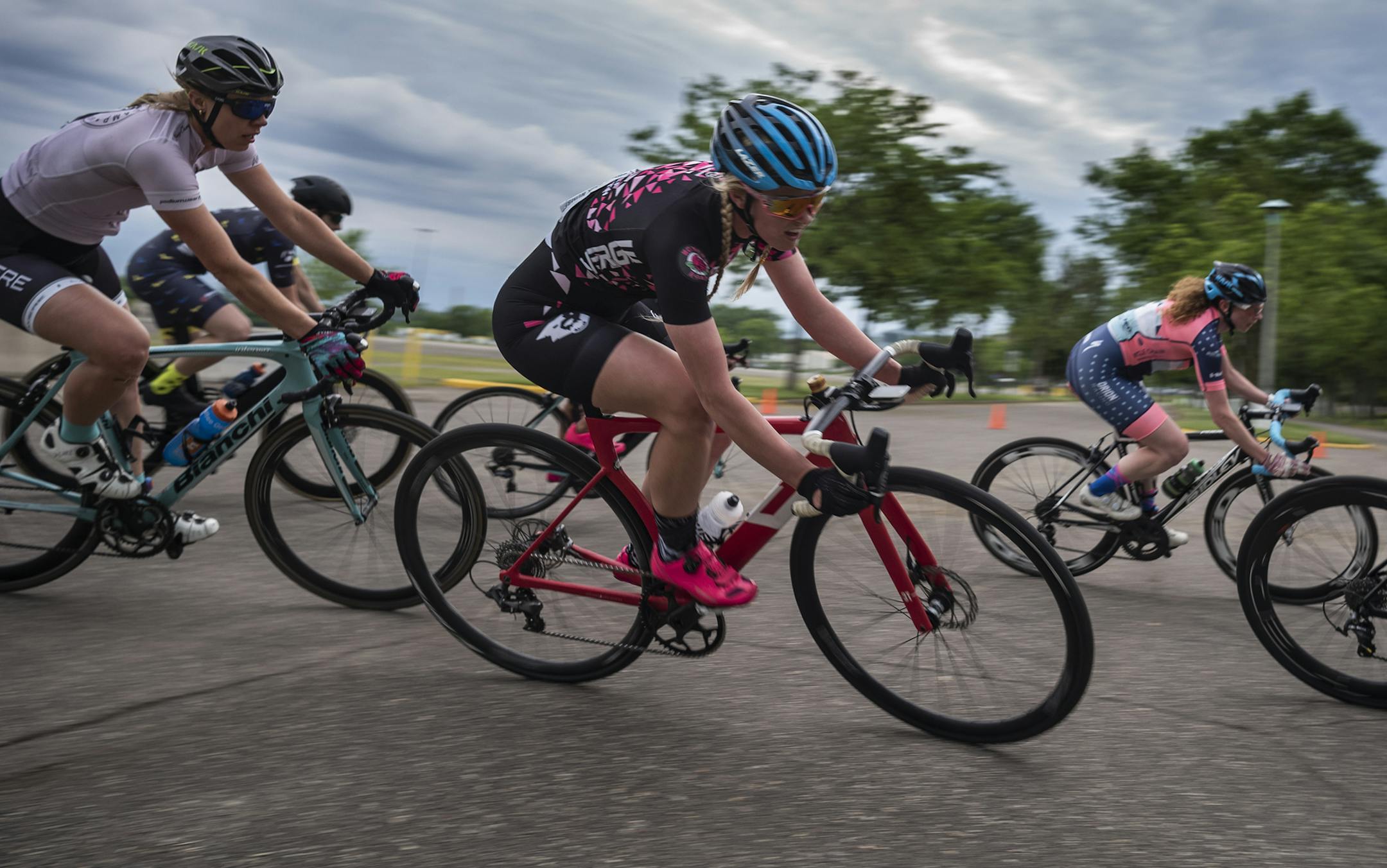 Female racers take a hairpin turn before an uphill during the criterium.] Once a week, part of the State Fairgrounds is turned over to bike racing. Some are skilled riders, while others are happy to be slow and be the first ones to race. We get a feel for the race scene, who's there, and what's the motivationRICHARD TSONG-TAATARII ¥ richard.tsong-taatarii@startribune.com
