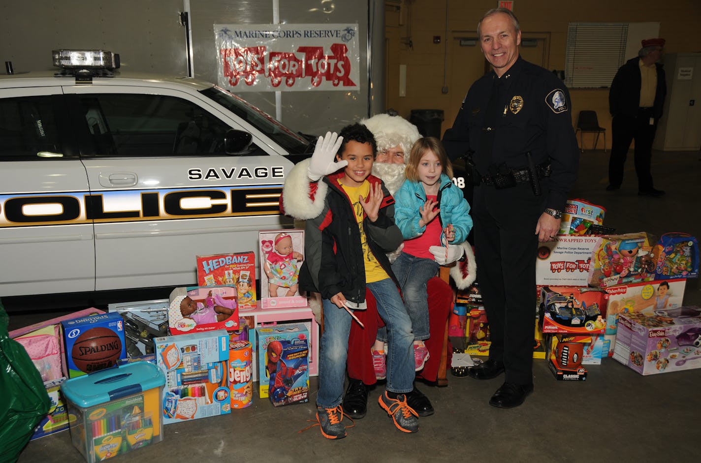 Courtesy city of Savage Savage Police Chief Rodney Seurer and Santa willbe on hand on Monday for a drive-through toy donation event at the police garage.