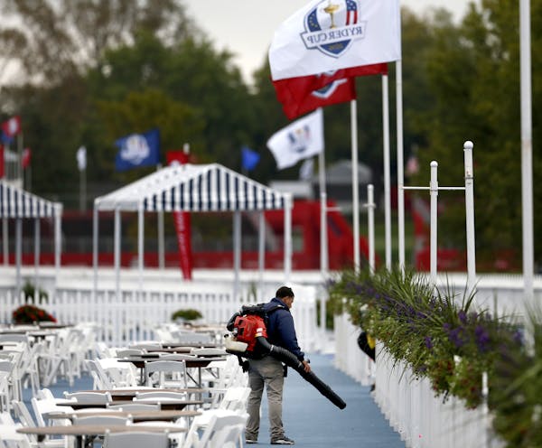 Crews worked on cleaning out the corporate tent area at Hazeltine National Gold Club in preparation for the Ryder Cup. ] CARLOS GONZALEZ cgonzalez@sta