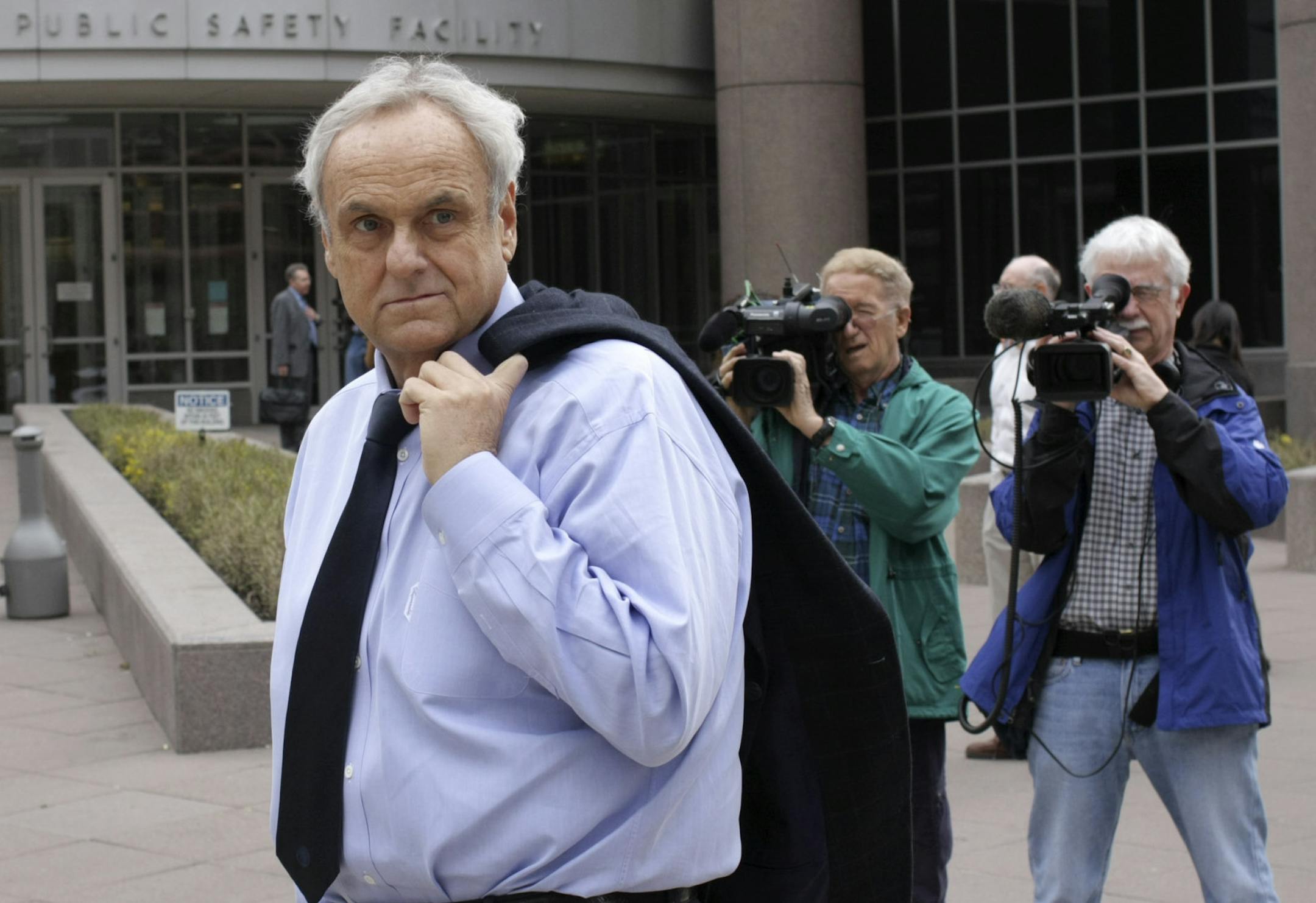 Denny Hecker walked outside the Hennepin County jail on April 2, 2010.