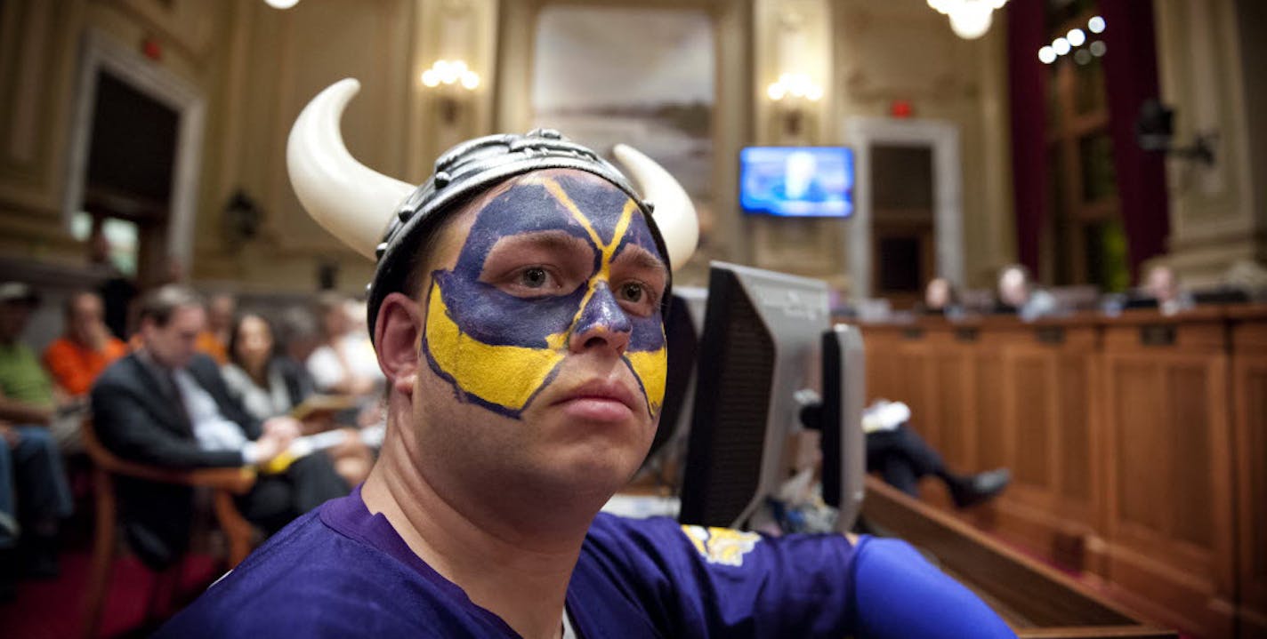 Vikings fan Tom Nickerson listened to the Minneapolis City Council discuss the stadium bill on Thursday.