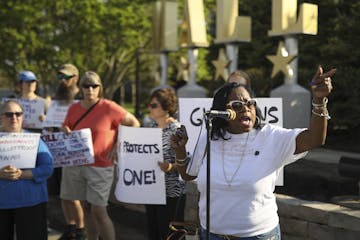 Valerie Castile said she was compelled to come to support the demonstrators Wednesday because the St. Anthony police officer who killed her son, Phila