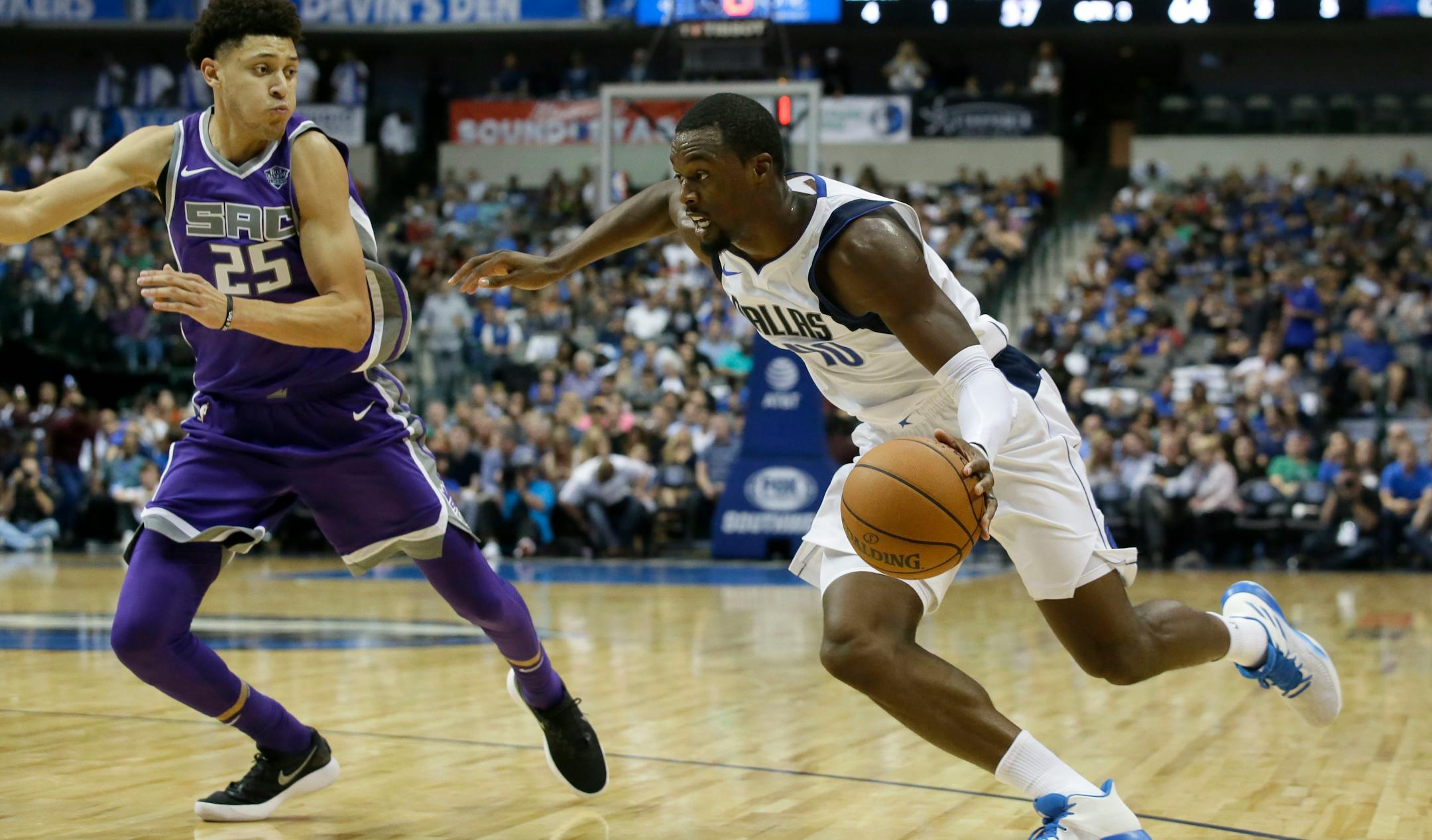 Dallas Mavericks forward Harrison Barnes (40) drives against Sacramento Kings forward Justin Jackson (25) during the second half of an NBA basketball game in Dallas, Friday, Oct. 20, 2017. (AP Photo/LM Otero)