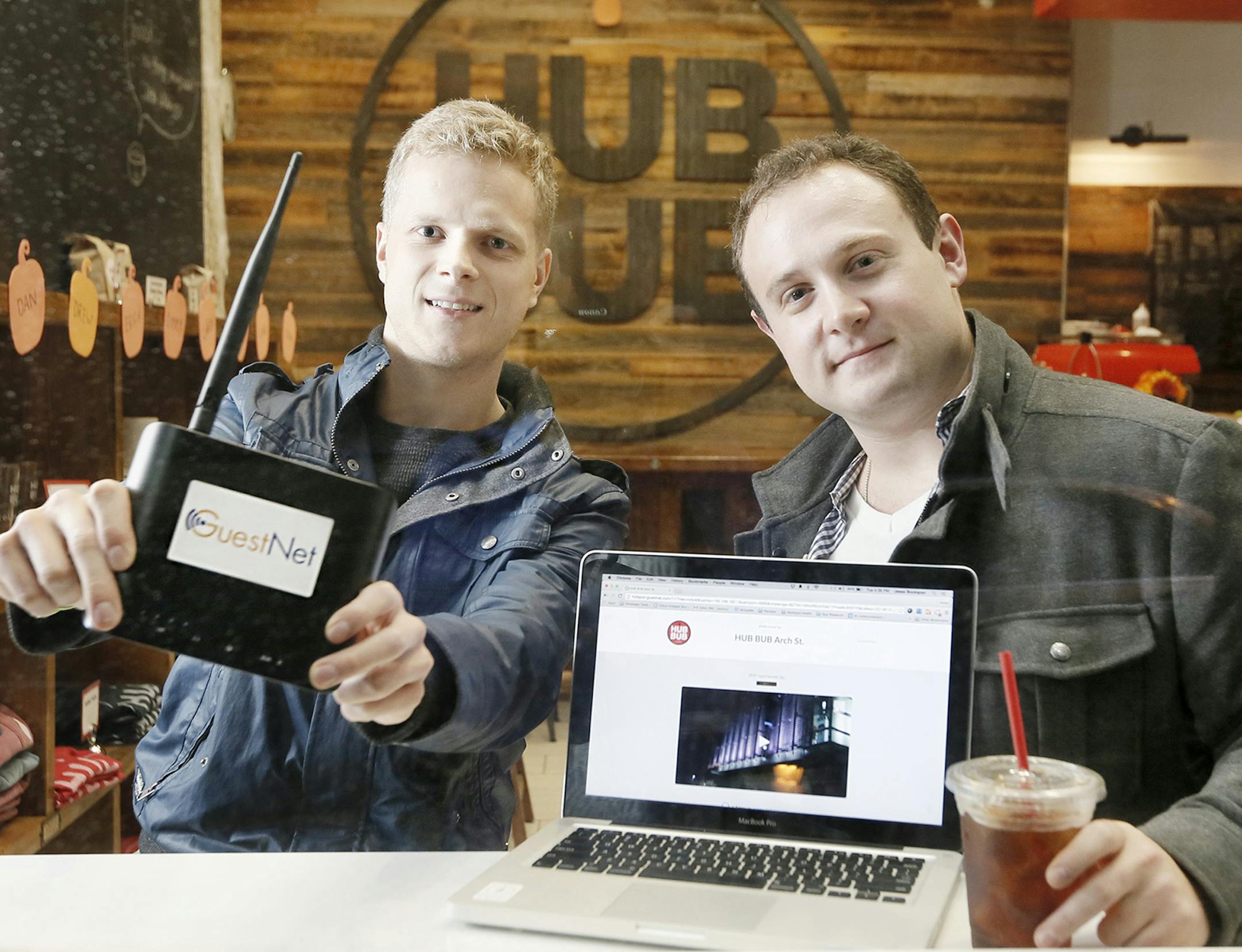 Guest Net founders Alan Jacobson, left, and Jesse Bookspan pose for a portrait HubBub Coffee in on Nov. 10, 2015 in Center City, Pa. (Elizabeth Robertson/Philadelphia Inquirer/TNS) ORG XMIT: 1177571