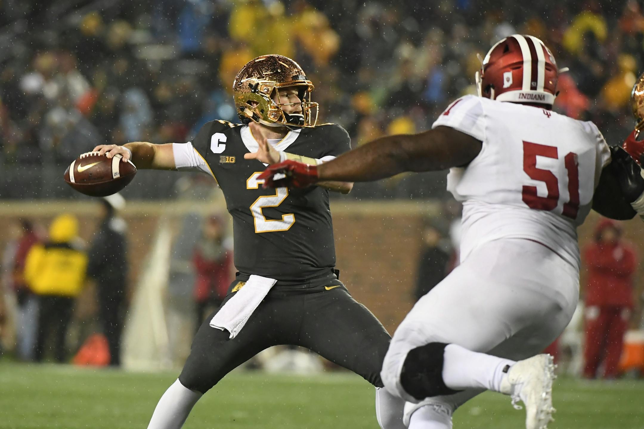 Minnesota Golden Gophers quarterback Tanner Morgan (2) threw a touchdown pass to wide receiver Tyler Johnson (6) in the second half against the Indiana Hoosiers.