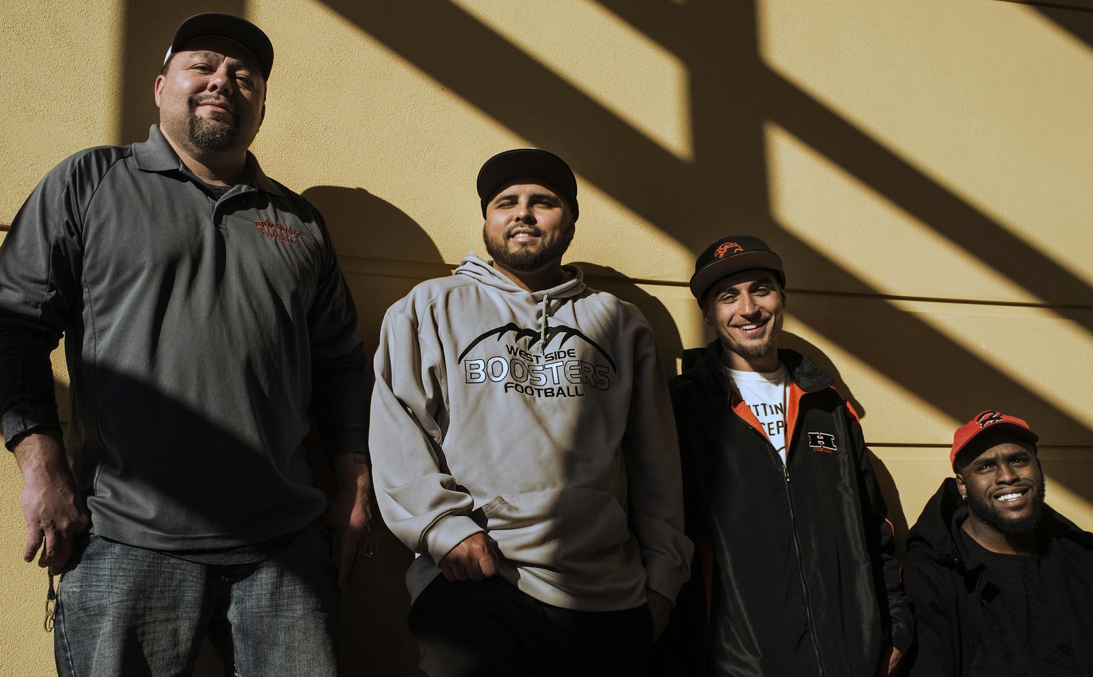 At the Wellstone Center, the St. Paul Humboldt football team hires coaches from within the community including(left to right) defensive coordinator Santino Franco, offensive coordinator Joe Smith, assistant coaches Tyler Chavez, and Larry Deeton.] Richard Tsong-Taatarii/rtsong-taatarii@startribune.com